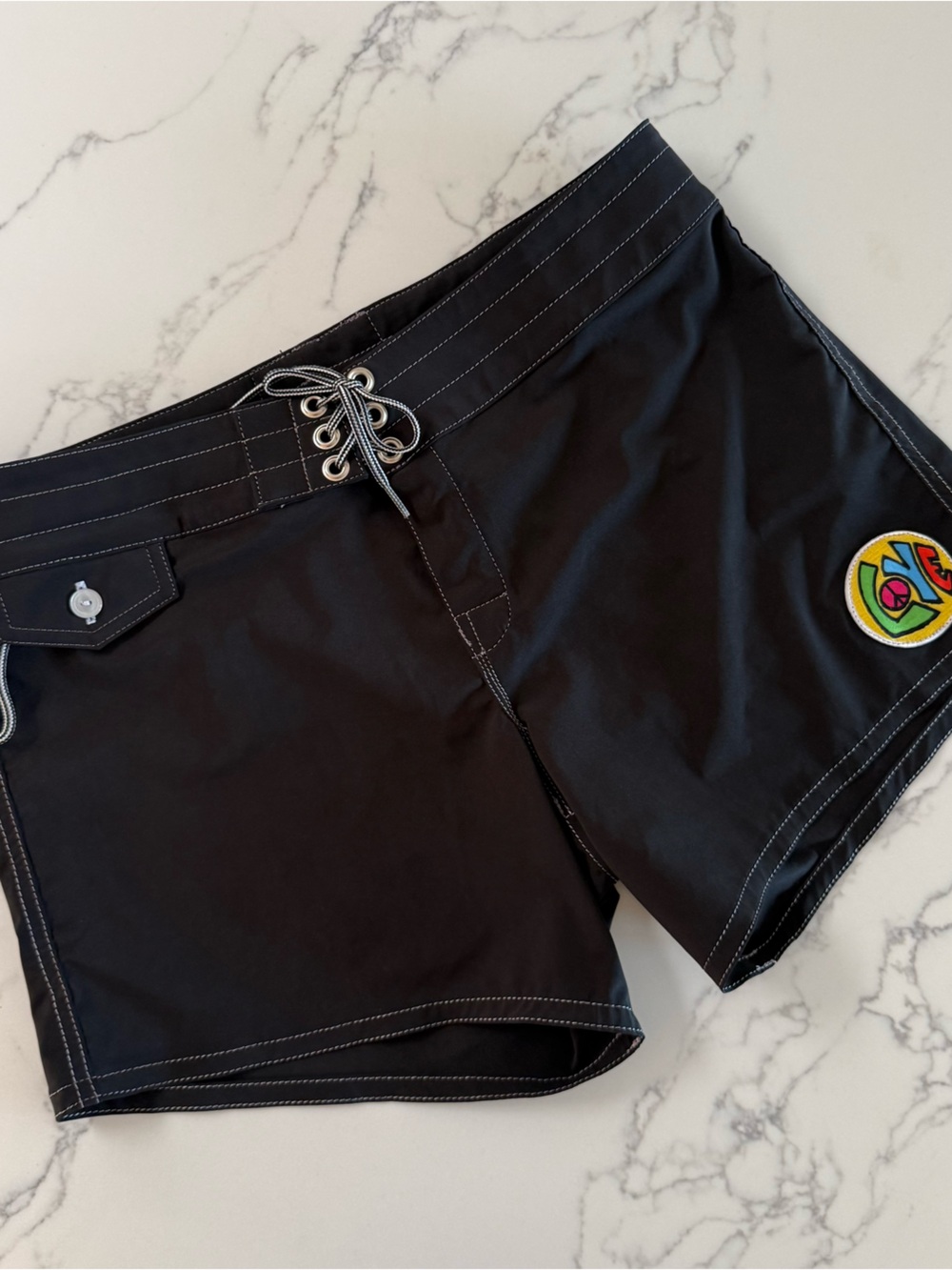 Black Board Shorts with Colorful Peace Patch